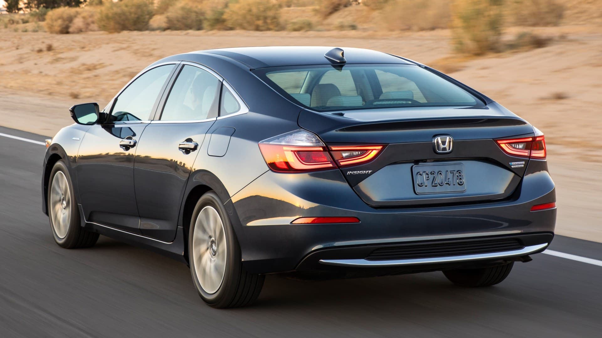 Honda Insight EX 2020 rear three-quarter on the road